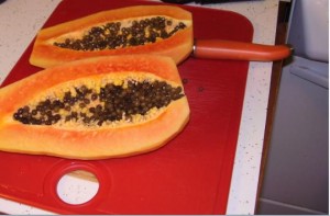 Papaya with skin removed and split to show seeds