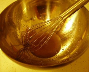 Whisking the sugar and vinegar for a minute