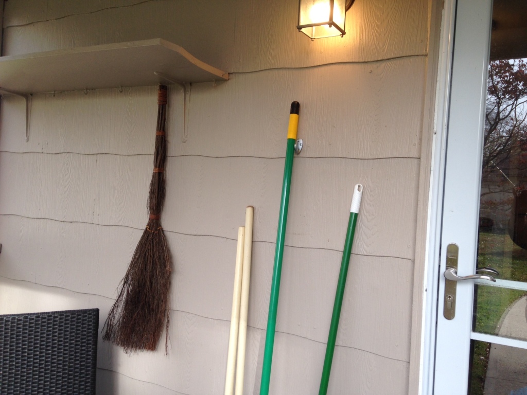 Trader Joe's Cinnamon Broom hanging out with our shovels- Look out winter! 